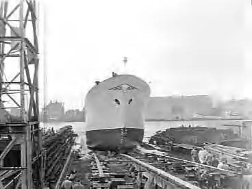 Fotocollectie Anefo — Tewaterlating "Spolesto" bij de Zaanlandse Scheepsbouw Maatschappij te Zaandam — Foto: Bilsen, Joop van / Anefo. Licentie: Set B: Rechtenvrij / Publiek Domein. Bron: Nationaal Archief. http://hdl.handle.net/10648/a971cf80-d0b4-102d-bcf8-003048976d84