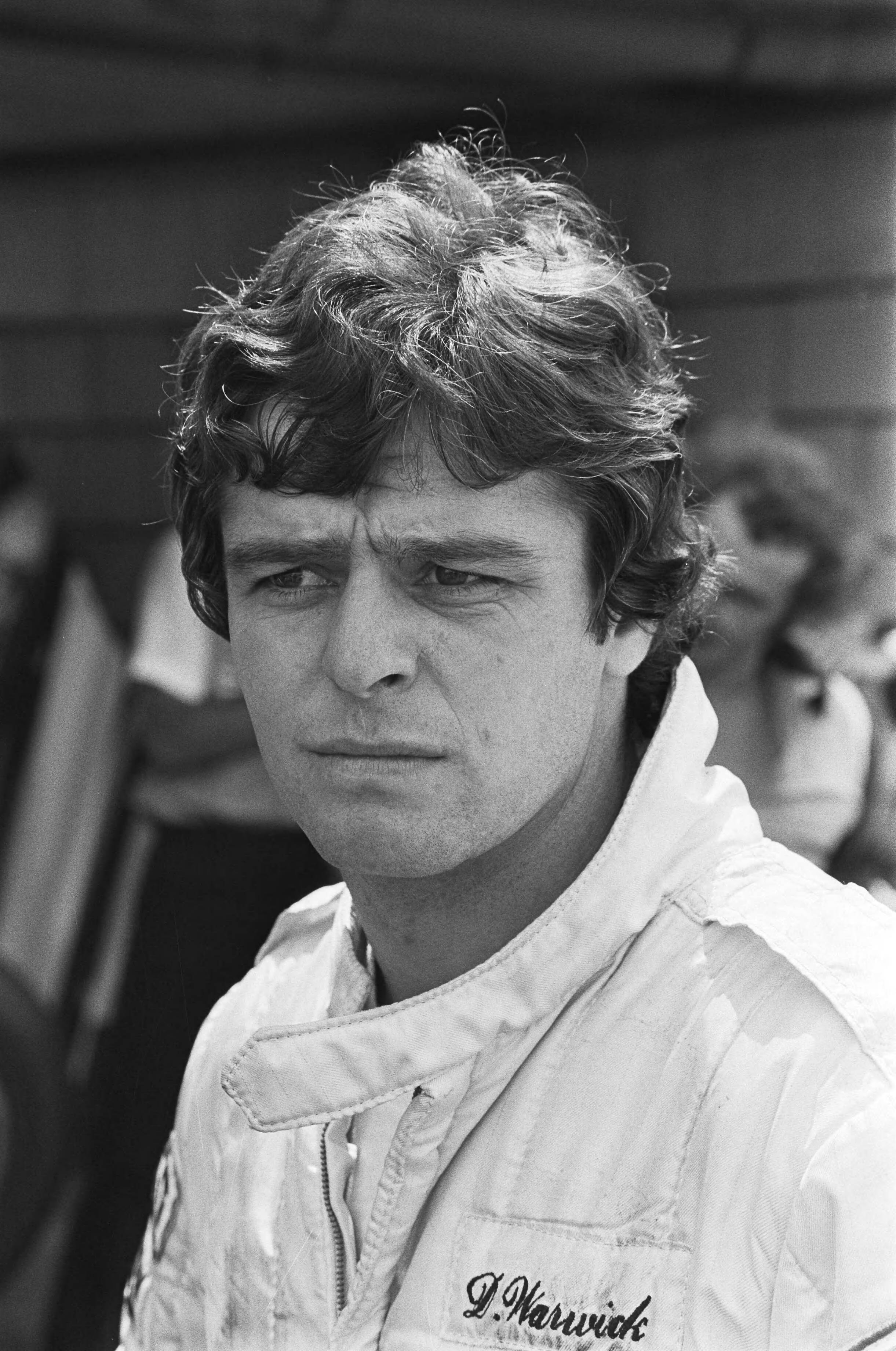 Fotocollectie Anefo — Grand Pris van Nederland te Zandvoort; koppen coureurs, Derek Warwick — Foto: Dijk, Hans van / Anefo. Licentie: Set B: Rechtenvrij / Publiek Domein. Bron: Nationaal Archief. http://hdl.handle.net/10648/ad1ac66e-d0b4-102d-bcf8-003048976d84