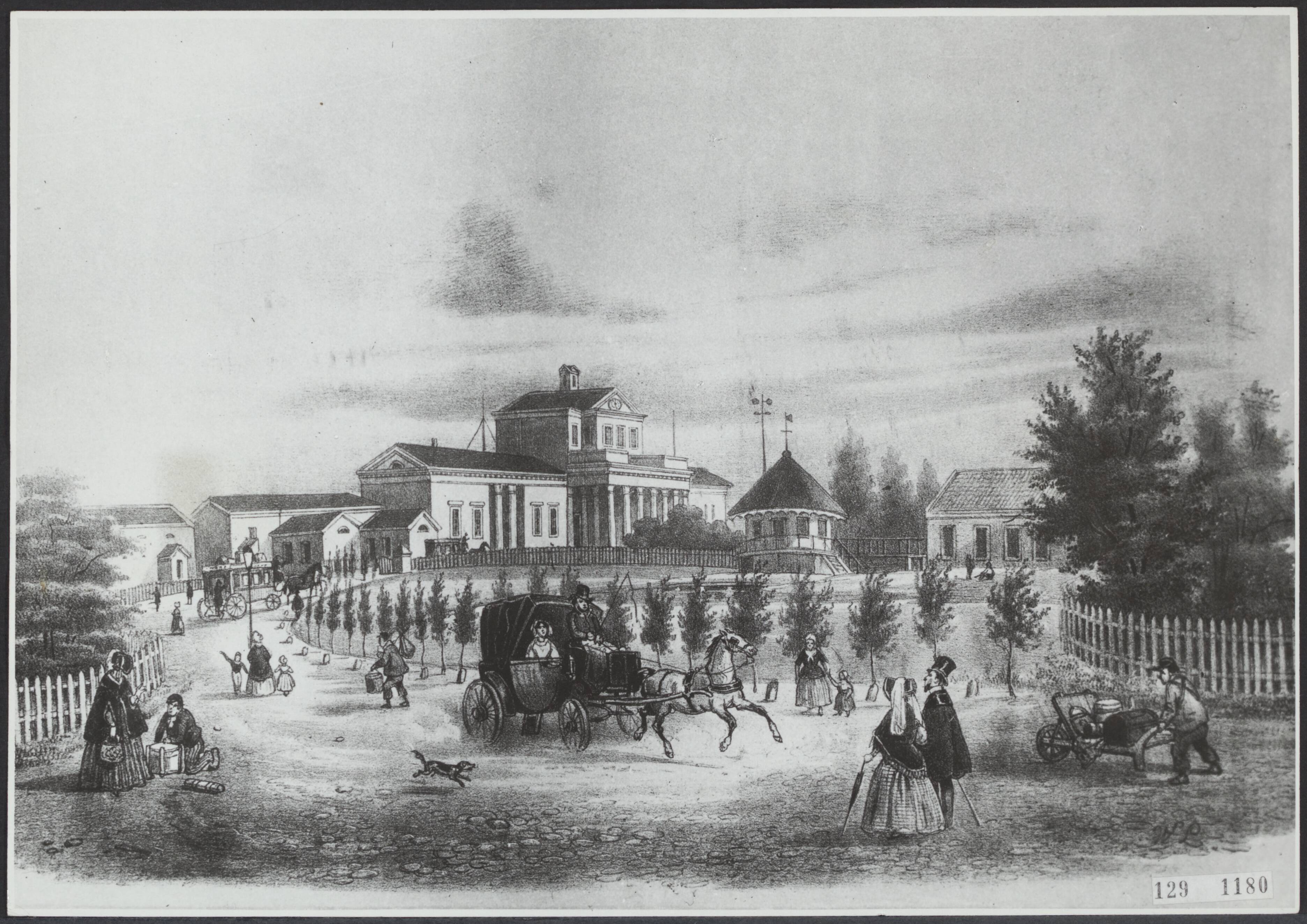 Fotocollectie Rijksvoorlichtingsdienst Eigen — Den Haag. Station Hollands Spoor. Lithografie in kleur van H.W. Last, 1850 — Foto: Fotodienst Gemeente Den Haag. Licentie: Set B: Rechtenvrij / Publiek Domein. Bron: Nationaal Archief. http://hdl.handle.net/10648/af48e984-d0b4-102d-bcf8-003048976d84
