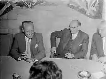 Fotocollectie Anefo — Aankomst van de gouverneur van Suriname, J. van Tilburg, op Schiphol. Persconferentie met informateur prof. De Gaay Fortman. Informateur De Gaay Fortman (PvdA) had het plan de PvdA-er Van Tilburg te vragen als premier van een nieuw kabinet, in plaats van Drees die hij als een obstakel voor een nieuw kabinet zag. De PvdA wilde echter niet (bron: Parlement.com) — Foto: Pot, Harry / Anefo. Licentie: Set B: Rechtenvrij / Publiek Domein. Bron: Nationaal Archief. http://hdl.handle.net/10648/a94e4b3c-d0b4-102d-bcf8-003048976d84