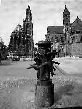 Steden [RVD] — Maastricht. [Beeld 'Hawt uuch vas' op het Vrijthof] — Foto: Rijksvoorlichtingsdienst (RVD). Licentie: Set B: Rechtenvrij / Publiek Domein. Bron: Nationaal Archief. http://hdl.handle.net/10648/af47293c-d0b4-102d-bcf8-003048976d84