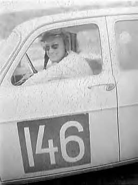 Tulpenrallye 1958 — Snelheidsproeven van de tiende internationale Tulpenrallye op het circuit van Zandvoort. M. Riess (Duitsland) , tweede in het algemeen klassement, met Alfa Romeo Giulietta T1 — Foto: Bilsen, Joop van / Anefo. Licentie: Set B: Rechtenvrij / Publiek Domein. Bron: Nationaal Archief. http://hdl.handle.net/10648/a97aff06-d0b4-102d-bcf8-003048976d84