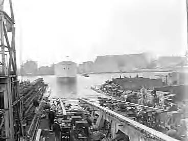 Fotocollectie Anefo — Tewaterlating "Spolesto" bij de Zaanlandse Scheepsbouw Maatschappij te Zaandam — Foto: Bilsen, Joop van / Anefo. Licentie: Set B: Rechtenvrij / Publiek Domein. Bron: Nationaal Archief. http://hdl.handle.net/10648/a971ce0e-d0b4-102d-bcf8-003048976d84