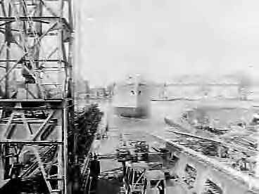 Fotocollectie Anefo — Tewaterlating vrachtschip "Spolanda" bij de Zaanlandsche Scheepsbouwmaatschappij te Zaandam. De doopplechtigheid werd verricht door mej. Danielle Smith, dochter van een van de commissarissen van rederij Spoorhout — Foto: Bilsen, Joop van / Anefo. Licentie: Set B: Rechtenvrij / Publiek Domein. Bron: Nationaal Archief. http://hdl.handle.net/10648/a97d2ff6-d0b4-102d-bcf8-003048976d84