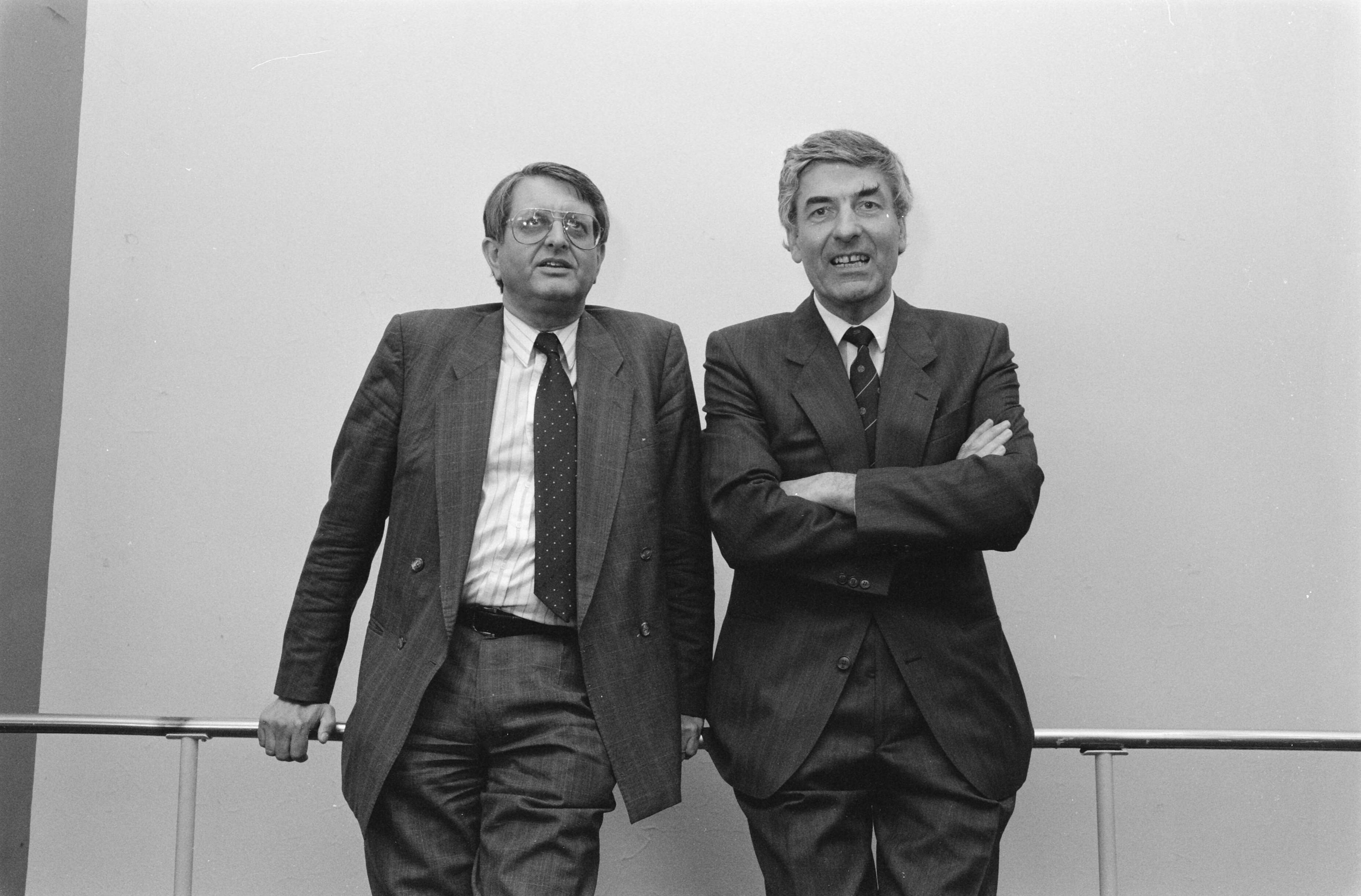 CDA-partijraad in Hilversum — Premier Ruud Lubbers (r) en lijsttrekker voor Europees Parlement Jean Penders — Foto: Bogaerts, Rob / Anefo. Licentie: Set B: Rechtenvrij / Publiek Domein. Bron: Nationaal Archief. http://hdl.handle.net/10648/ad730ab8-d0b4-102d-bcf8-003048976d84