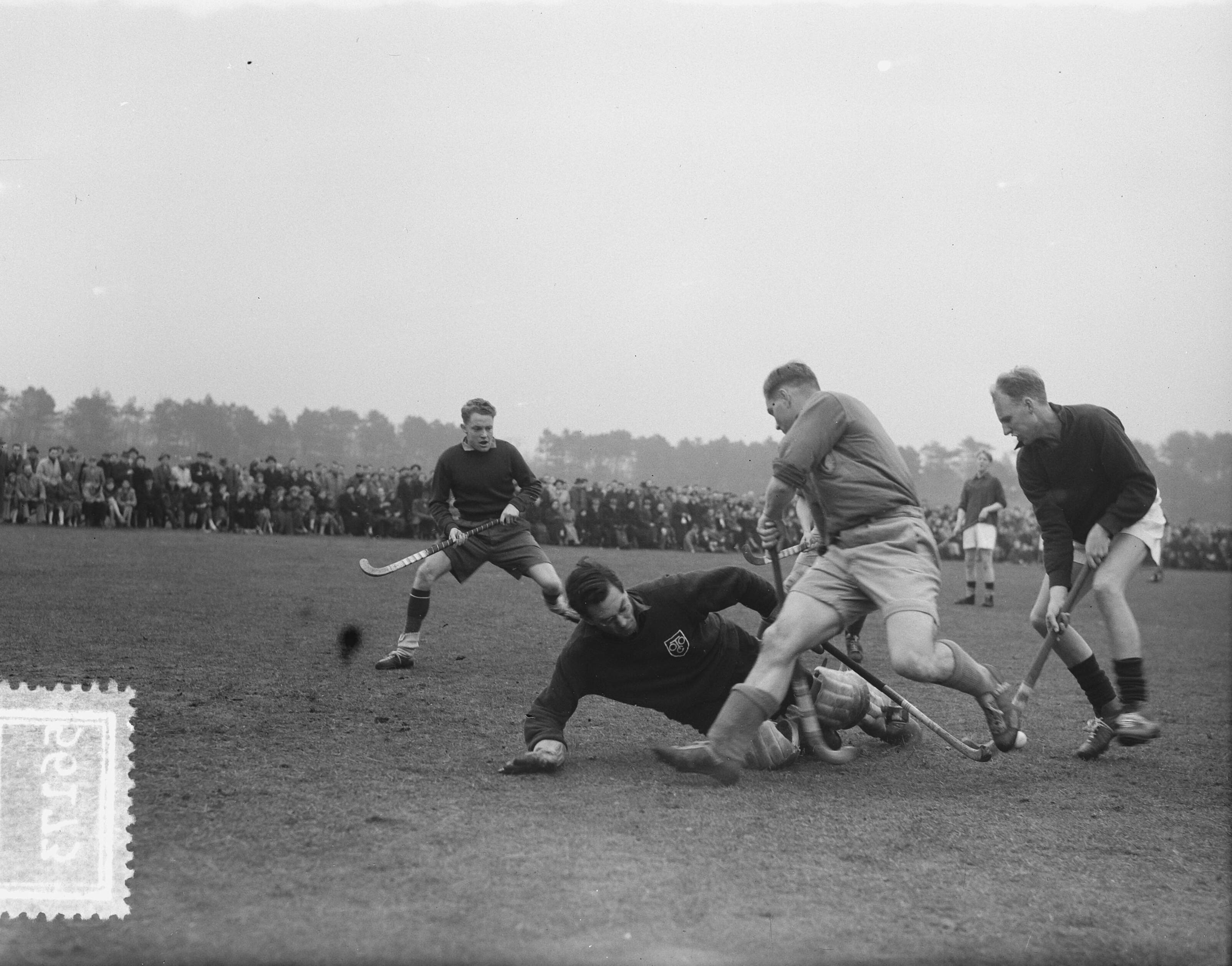 Fotocollectie Anefo — Hockey. TOGO tegen HHYC Den Haag 0-3. Spelmoment — Foto: Duinen, H. van / Anefo. Licentie: Set B: Rechtenvrij / Publiek Domein. Bron: Nationaal Archief. http://hdl.handle.net/10648/a908cef4-d0b4-102d-bcf8-003048976d84