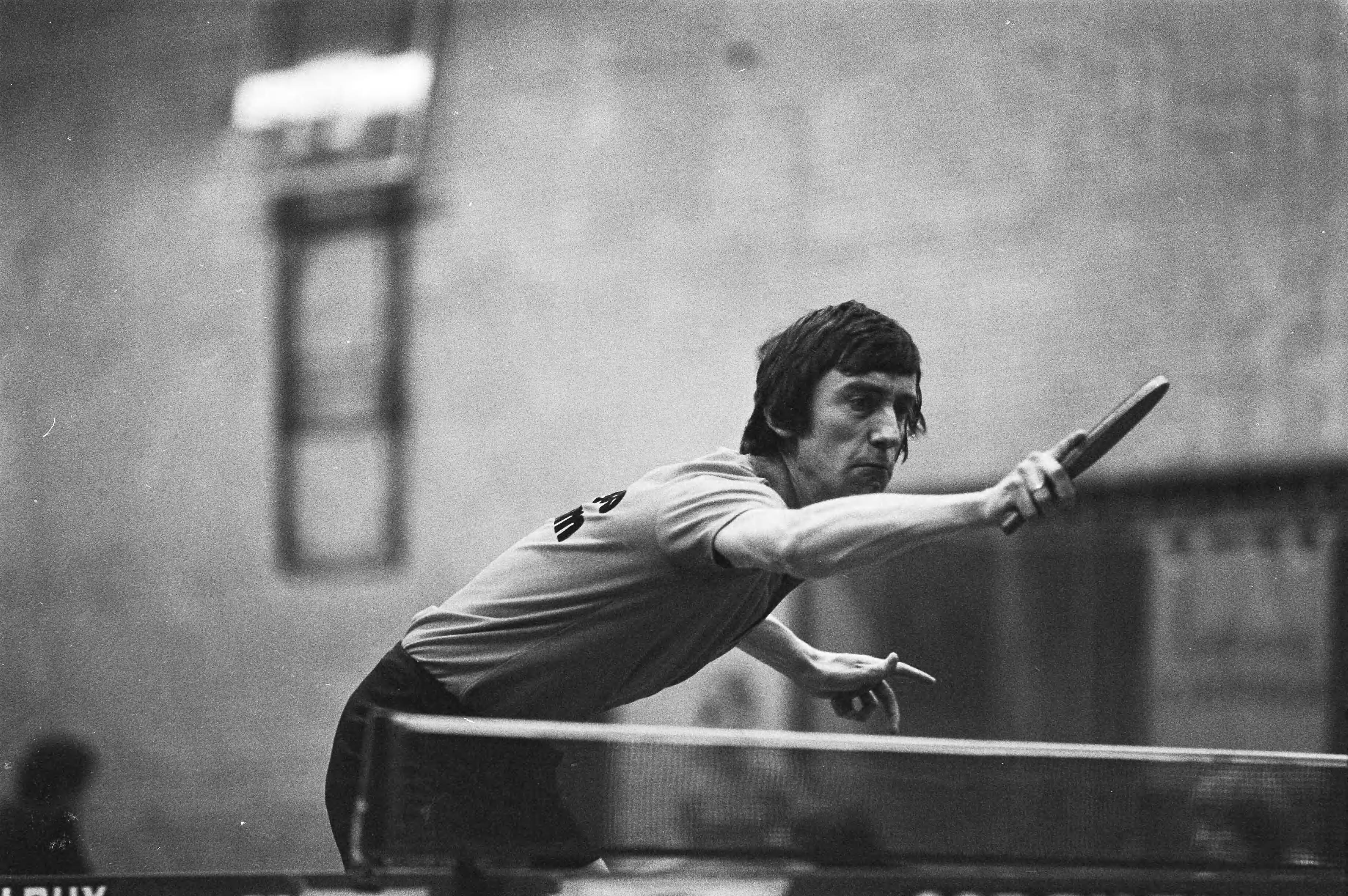 Fotocollectie Anefo — Tafeltennis om NTTB-cup in Huizen; Bert van de Helm in actie — Foto: Verhoeff, Bert / Anefo. Licentie: Set B: Rechtenvrij / Publiek Domein. Bron: Nationaal Archief. http://hdl.handle.net/10648/acaab5b8-d0b4-102d-bcf8-003048976d84